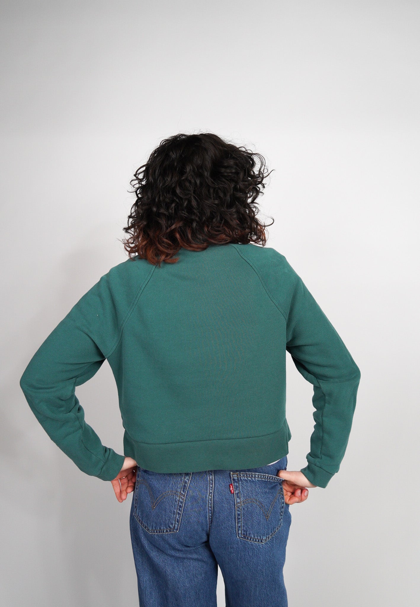 MEDIUM Green Mock Neck Crop with "Spinning Season" design