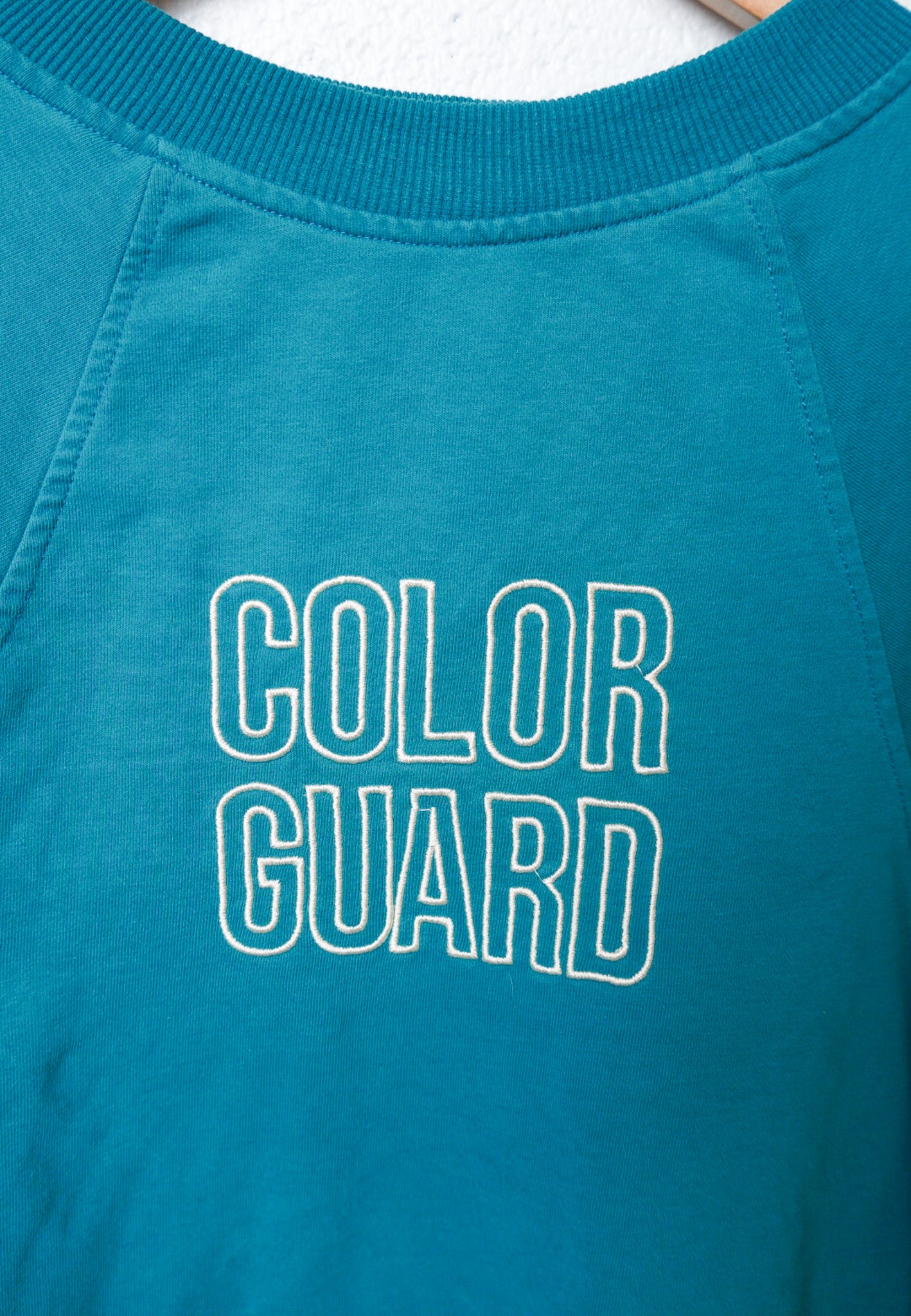 MEDIUM Teal Blue Cropped Crewneck with block "COLOR GUARD" design