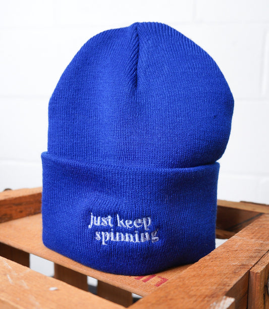 JUST KEEP SPINNING BEANIE