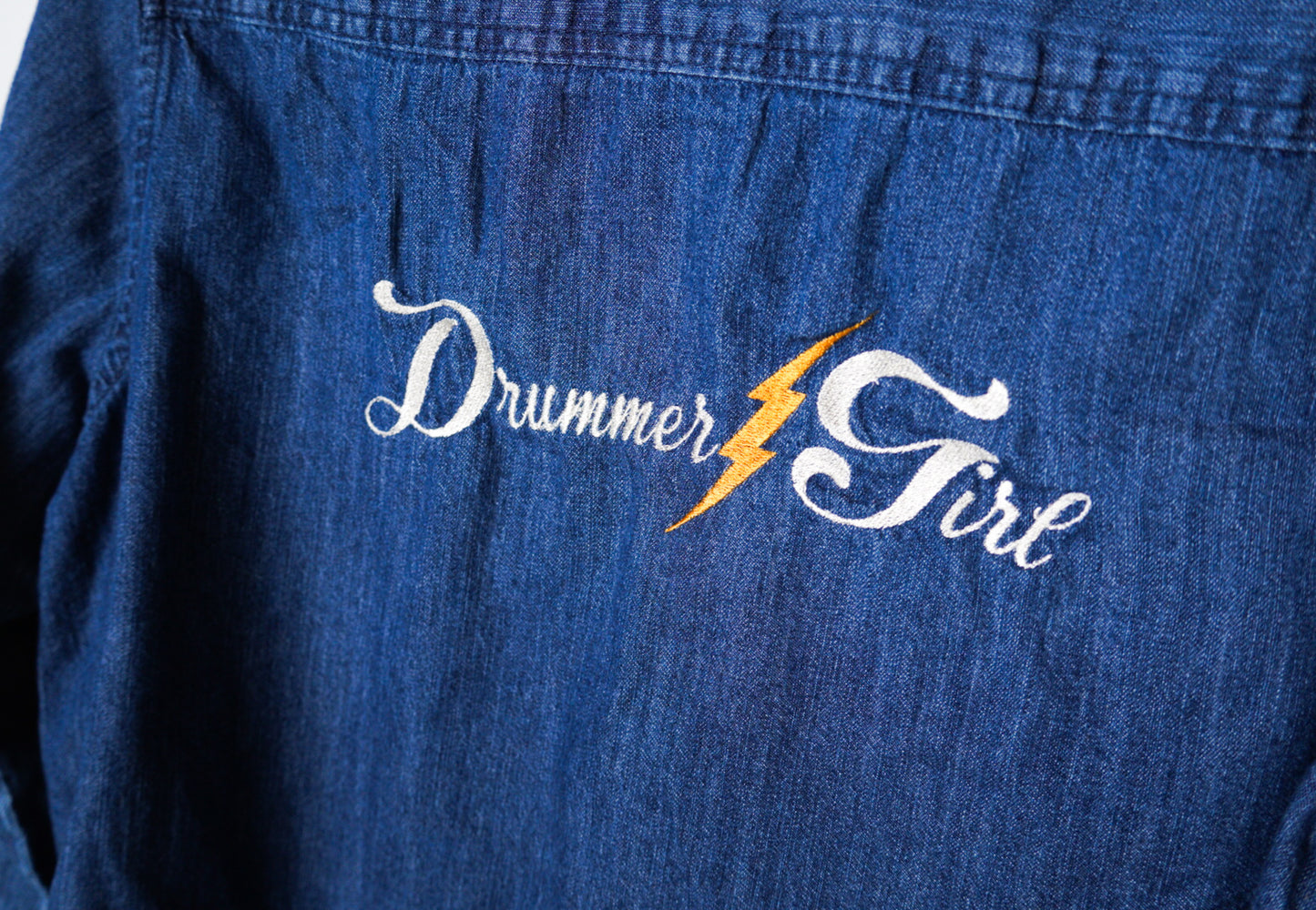 LARGE- UNIVERSAL THREADS Denim Button up with "Drummer Girl" design
