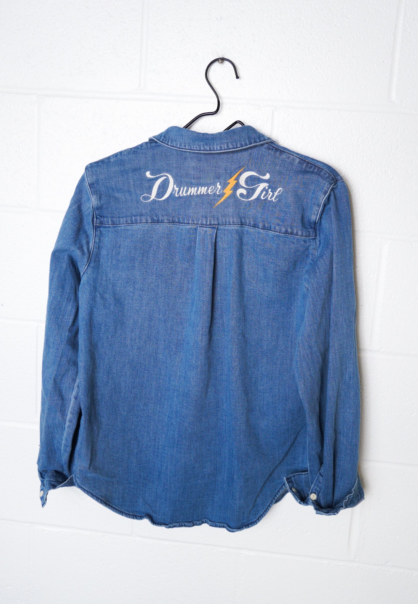 MEDIUM- UNIVERSAL THREADS Denim Button up with "Drummer Girl" design