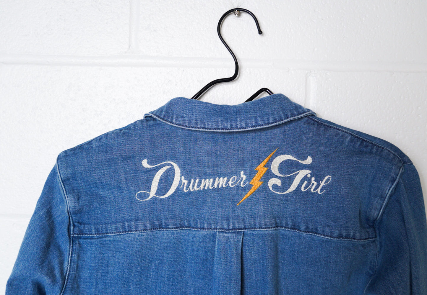 MEDIUM- UNIVERSAL THREADS Denim Button up with "Drummer Girl" design
