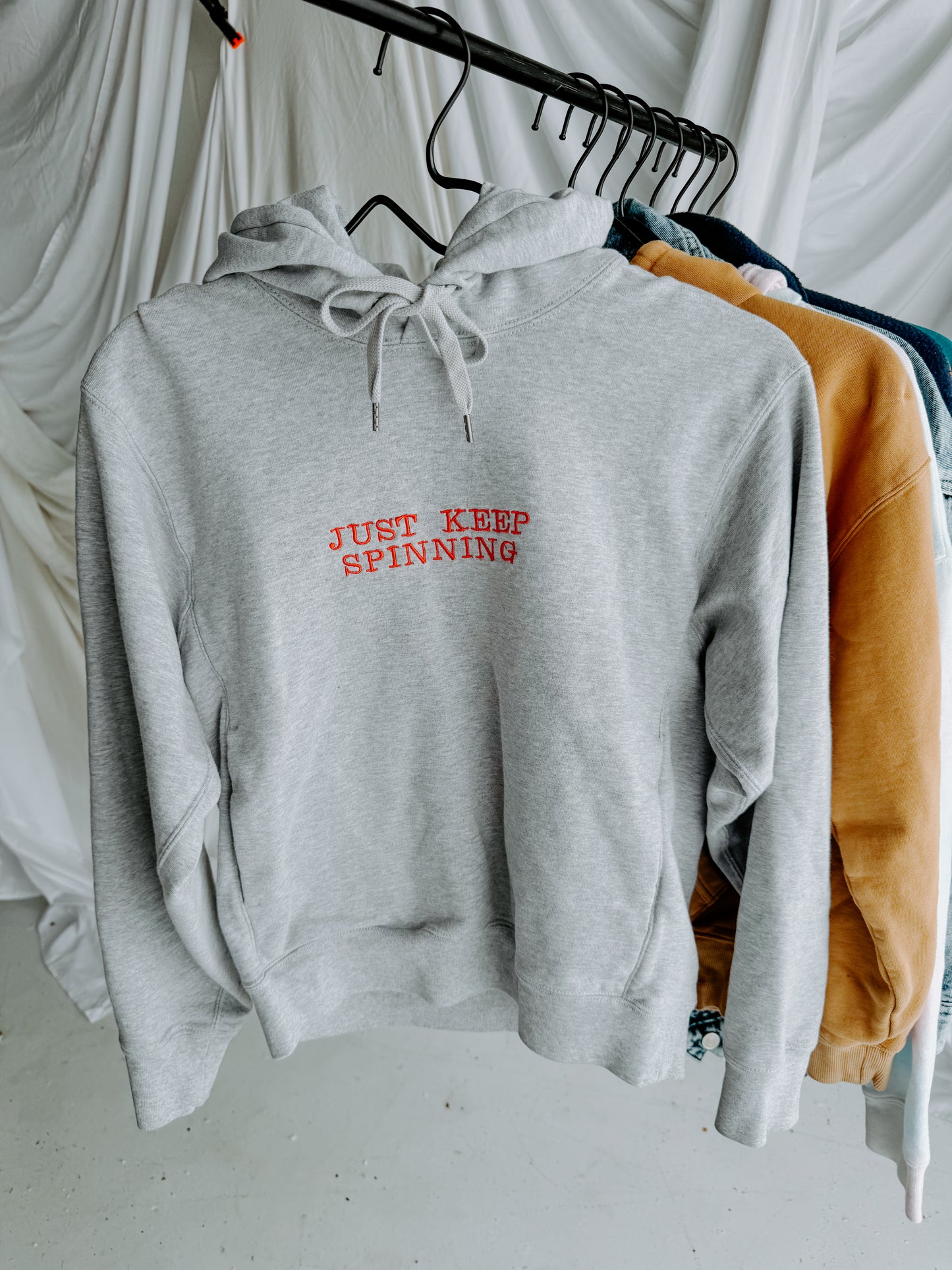 X-SMALL -UNIQLO- Grey "Just Keep Spinning" Hoodie
