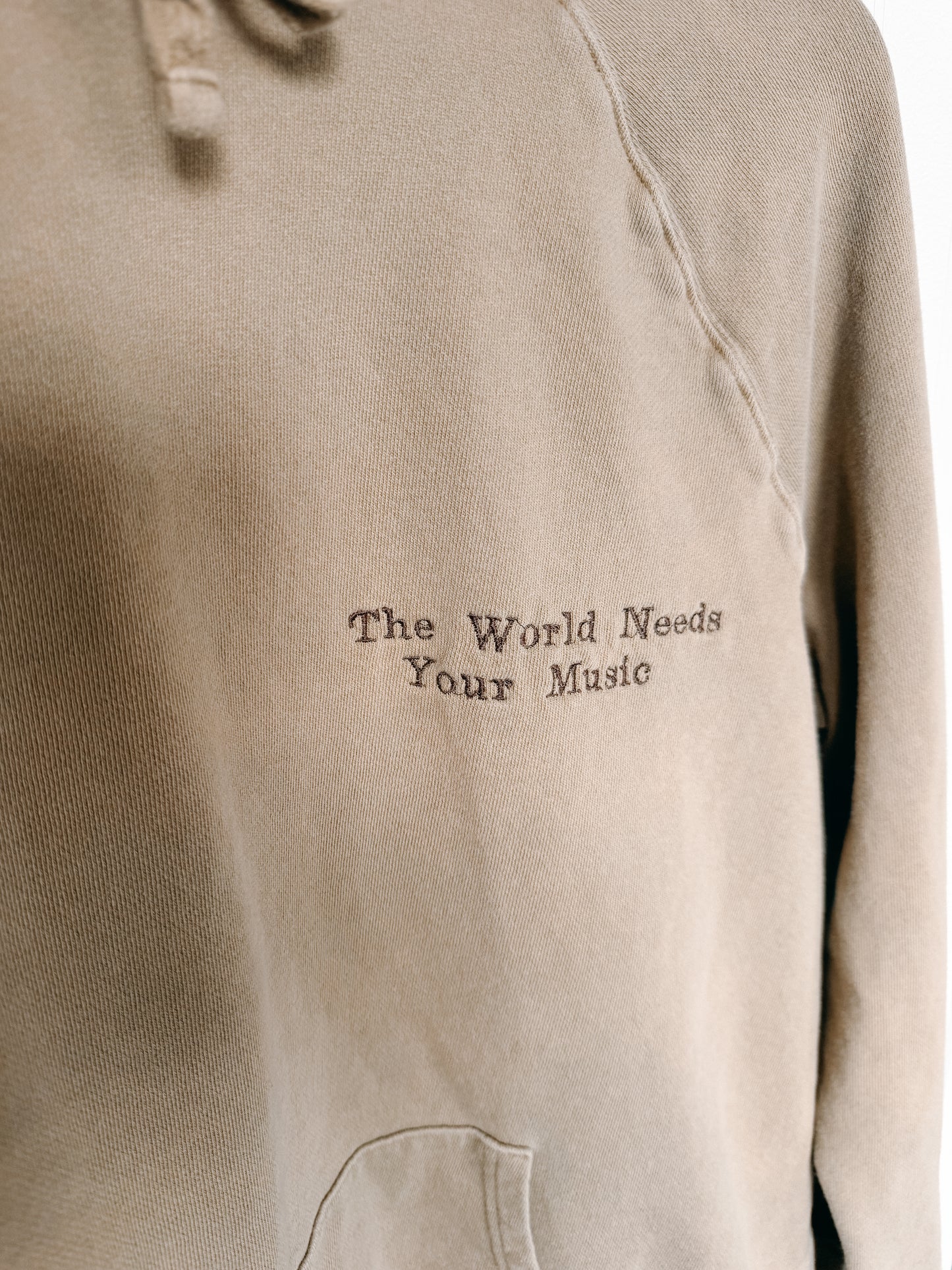 XLARGE -GOODFELLOW- Hoodie with "The World Needs Your Music" design
