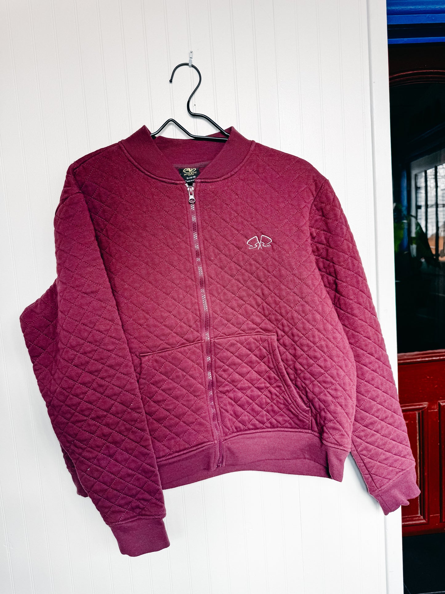 XLARGE Quilted Jacket with "Apres Spin" design