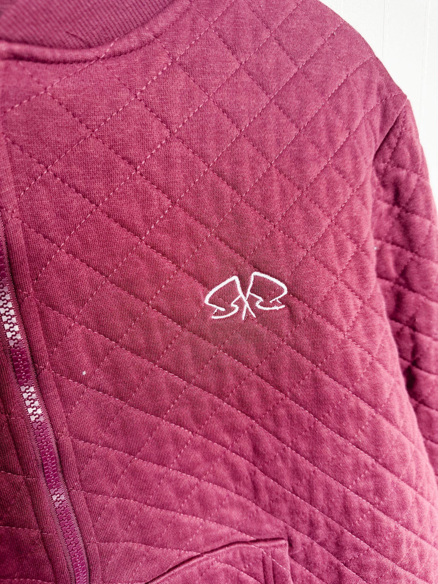 XLARGE Quilted Jacket with "Apres Spin" design
