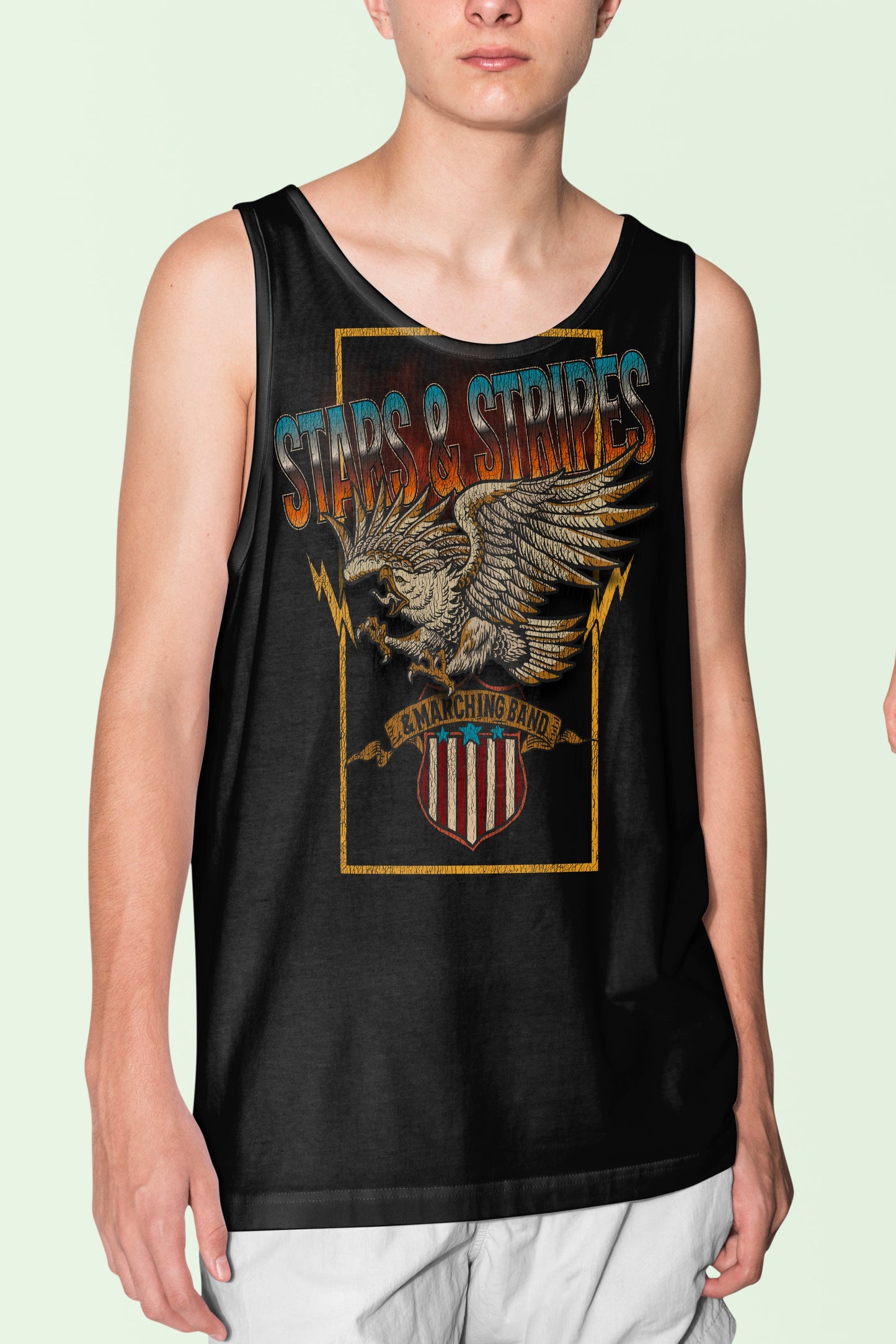 Person wearing a black tank top with an eagle design on a light green background